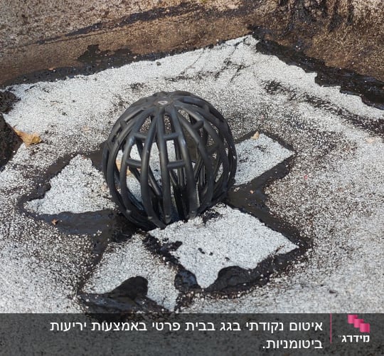 כיסוי ניקוז עם איטום זפת על גג